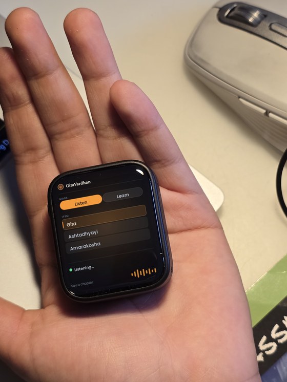 The touchscreen device showing a menu: Mode, Listen or Learn, and Item, Gita, Ashtadhyayi or Amarakosha, with Listening shown at the bottom.