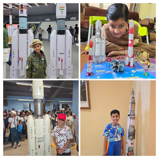 Paper models of ISRO launch vehicles GSLV Mk III, PSLV and SLV-3, beside a collection of built space models.